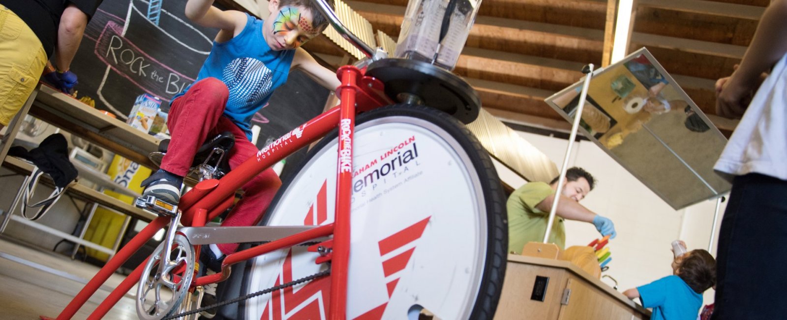 The Abraham Lincoln Memorial Hospital Smoothie Bike features a pedal-powered blender that students pedal to make healthy snacks as part of the Coordinated Approach to Child Health (CATCH) program activities. [Abraham Lincoln Memorial Hospital] 