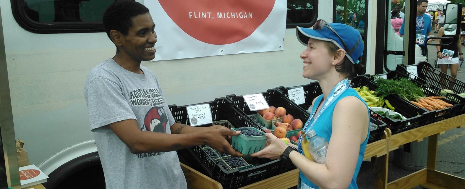 Flint Fresh Mobile Market, purchasing blue berries