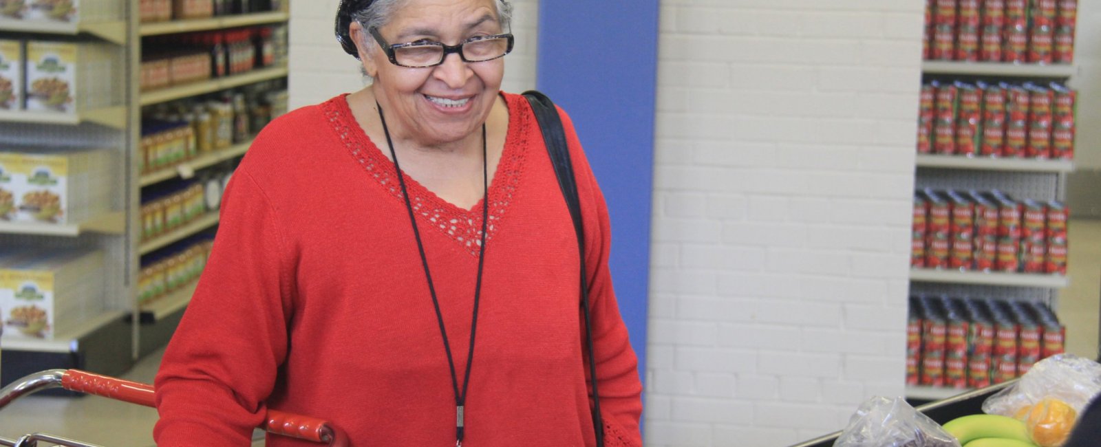 Jean Parks: Food Club member at checkout with her fresh foods (Community Food Club)