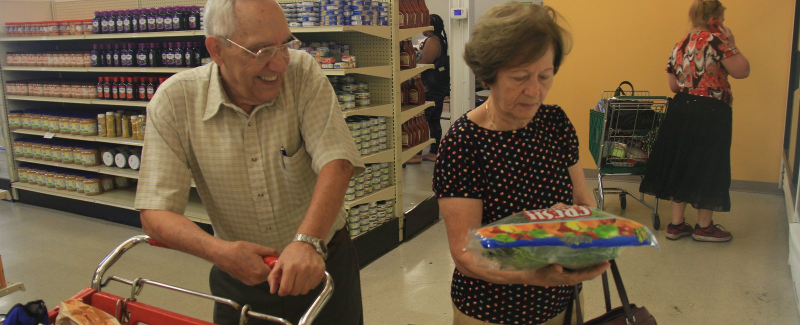 Members shop for groceries 