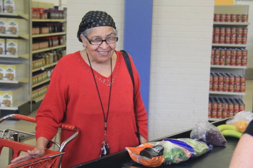 Jean Parks: Food Club member at checkout with her fresh foods (Community Food Club)