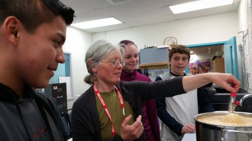 Healthy Roots Farm to School Coordinator working with kids at Fairfield School, Vermont (Northwestern Medical Center). 