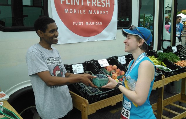 Flint Fresh Mobile Market, purchasing blue berries